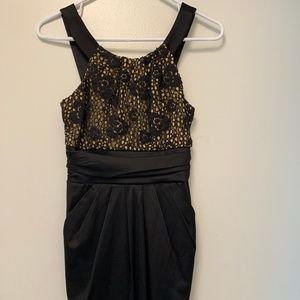 Black cocktail dress with pockets